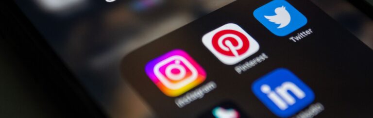 A smartphone screen displaying popular social media applications like Instagram and Twitter.